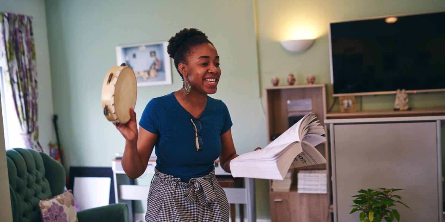 young woman with tambourine